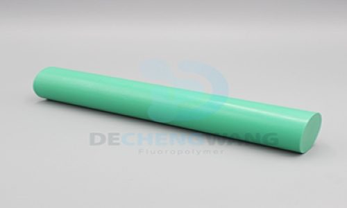 A green PTFE molded rod