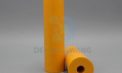 Two yellow molded PTFE tubes